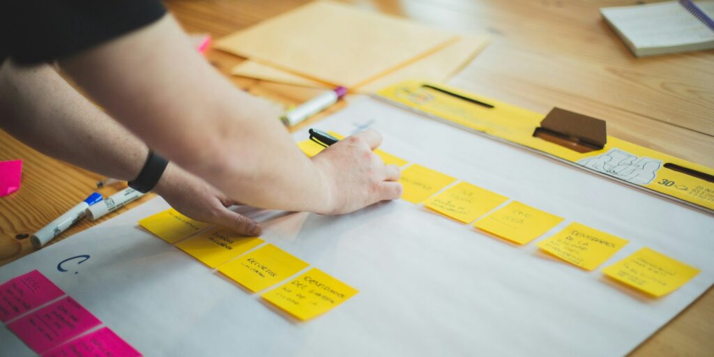 Sticky notes on a planning sheet